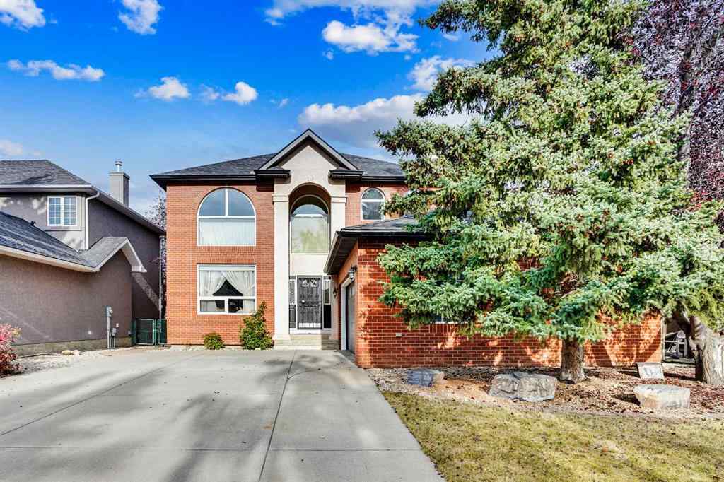 MLS® A2260846 - 38 Strathridge Crescent SW in Strathcona Park Calgary, Residential