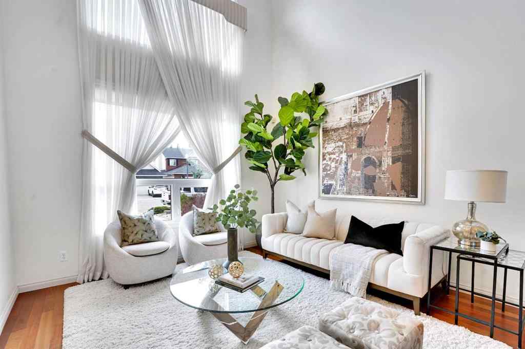 MLS® A2260846 - 38 Strathridge Crescent SW in Strathcona Park Calgary, Residential