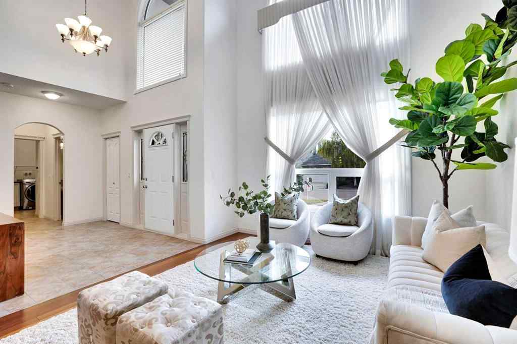 MLS® A2260846 - 38 Strathridge Crescent SW in Strathcona Park Calgary, Residential