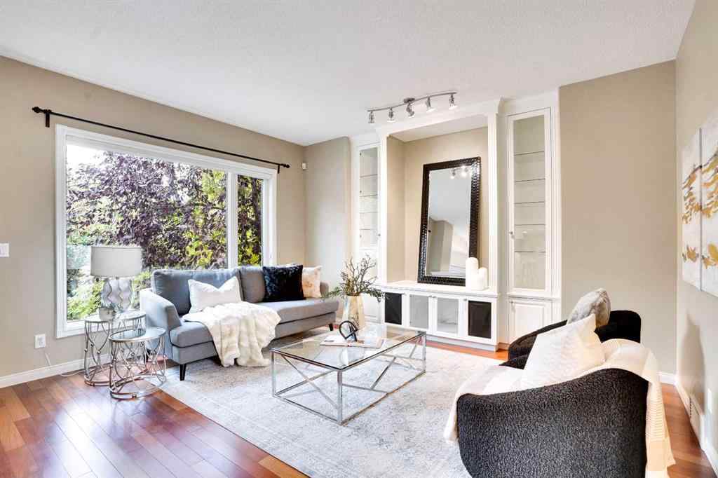 MLS® A2260846 - 38 Strathridge Crescent SW in Strathcona Park Calgary, Residential