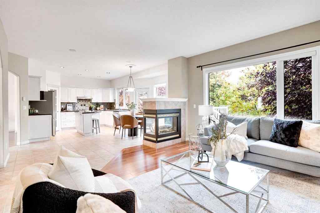 MLS® A2260846 - 38 Strathridge Crescent SW in Strathcona Park Calgary, Residential