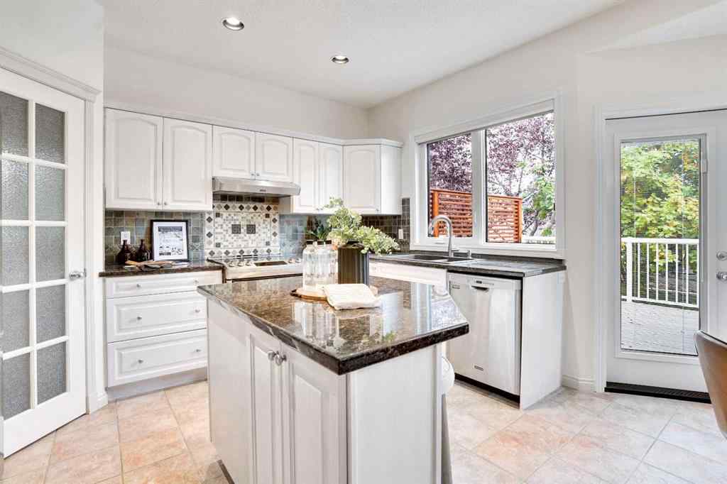 MLS® A2260846 - 38 Strathridge Crescent SW in Strathcona Park Calgary, Residential