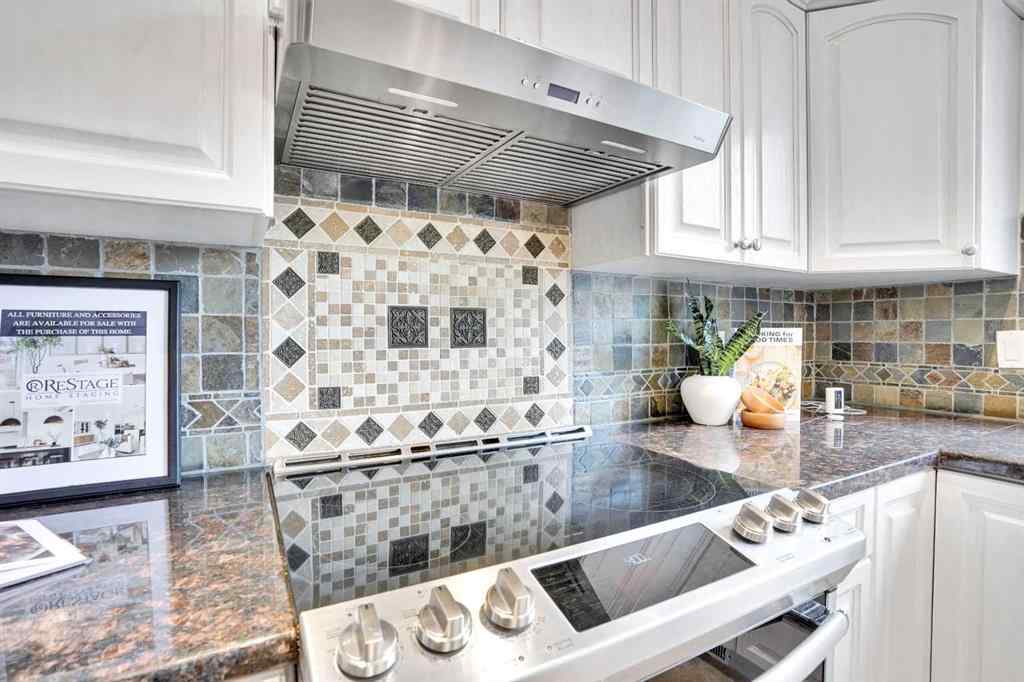 MLS® A2260846 - 38 Strathridge Crescent SW in Strathcona Park Calgary, Residential