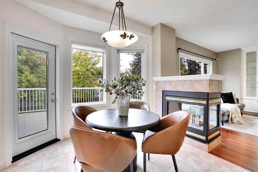 MLS® A2260846 - 38 Strathridge Crescent SW in Strathcona Park Calgary, Residential