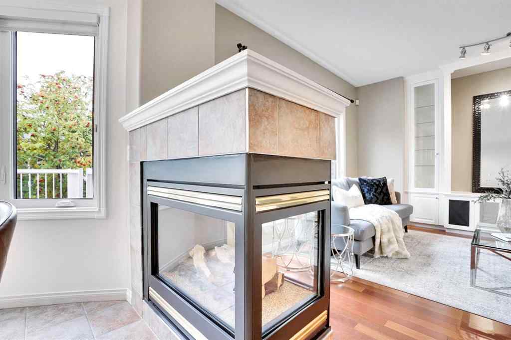 MLS® A2260846 - 38 Strathridge Crescent SW in Strathcona Park Calgary, Residential