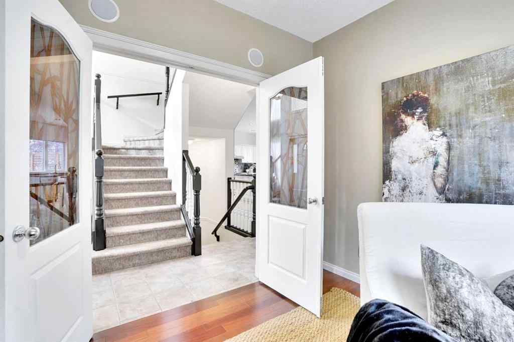 MLS® A2260846 - 38 Strathridge Crescent SW in Strathcona Park Calgary, Residential