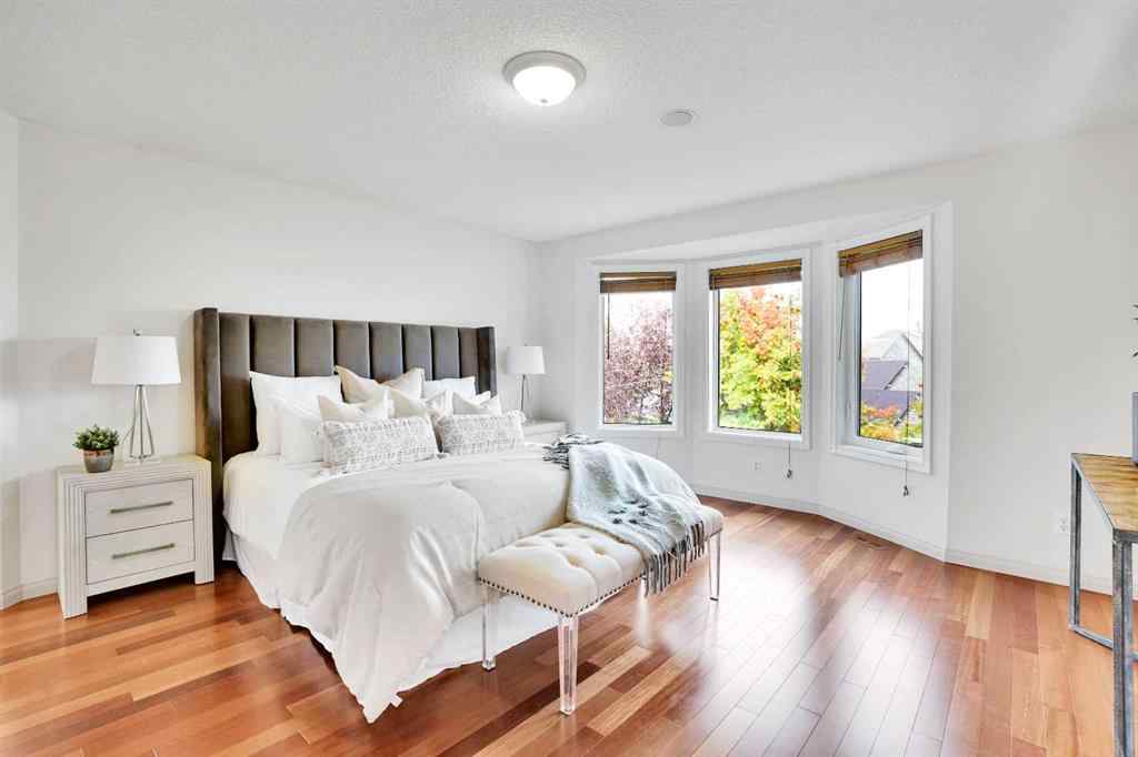 MLS® A2260846 - 38 Strathridge Crescent SW in Strathcona Park Calgary, Residential