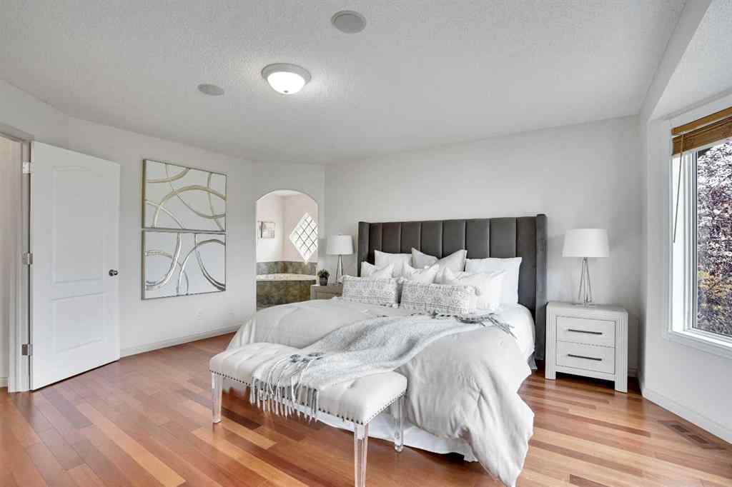 MLS® A2260846 - 38 Strathridge Crescent SW in Strathcona Park Calgary, Residential