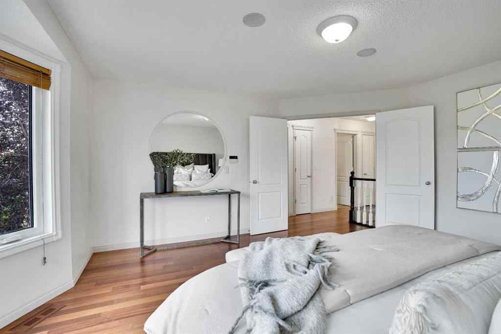 MLS® A2260846 - 38 Strathridge Crescent SW in Strathcona Park Calgary, Residential