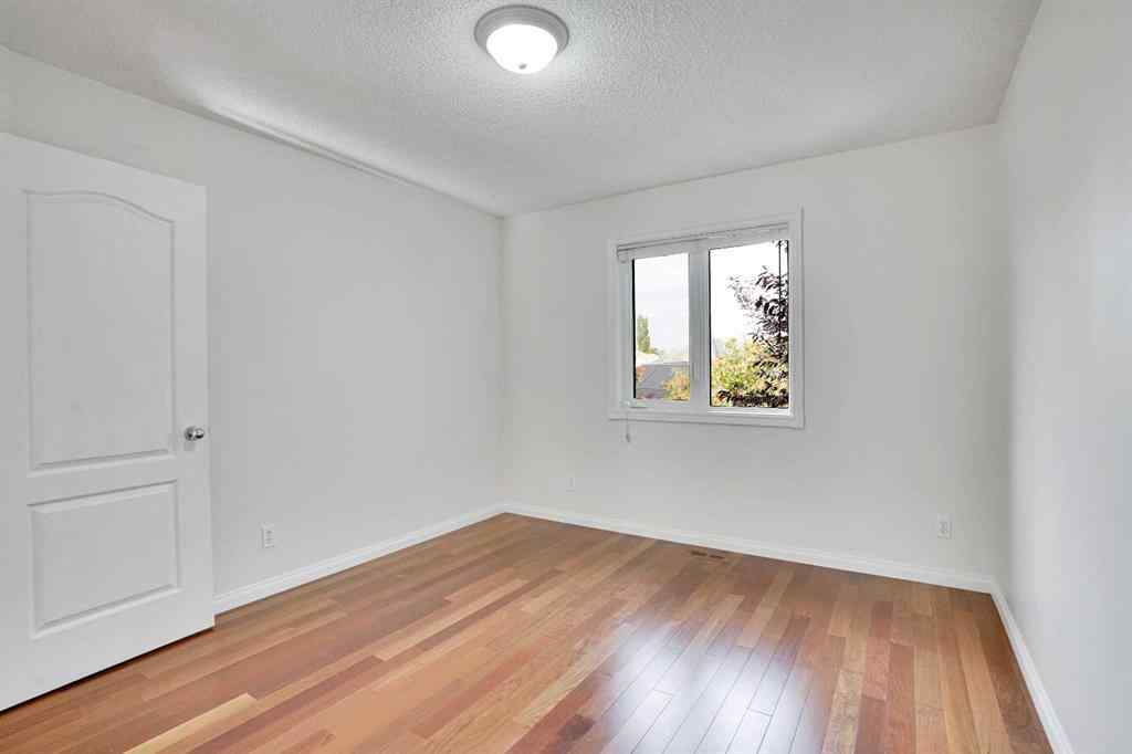 MLS® A2260846 - 38 Strathridge Crescent SW in Strathcona Park Calgary, Residential