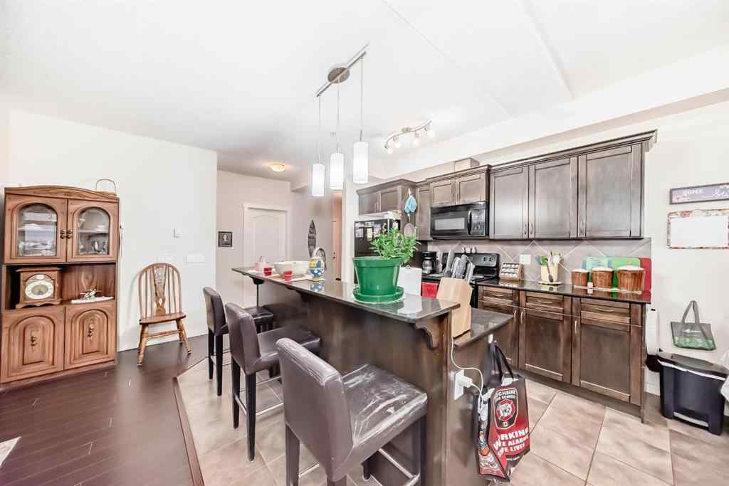 MLS® A2260859 - Unit #204 141 Mountain Street NW in East End Cochrane, Residential