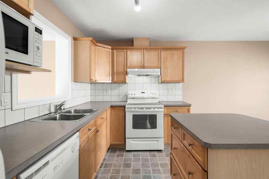 MLS® A2260860 - 70 Crystal Shores Cove  in Crystal Shores Okotoks, Residential