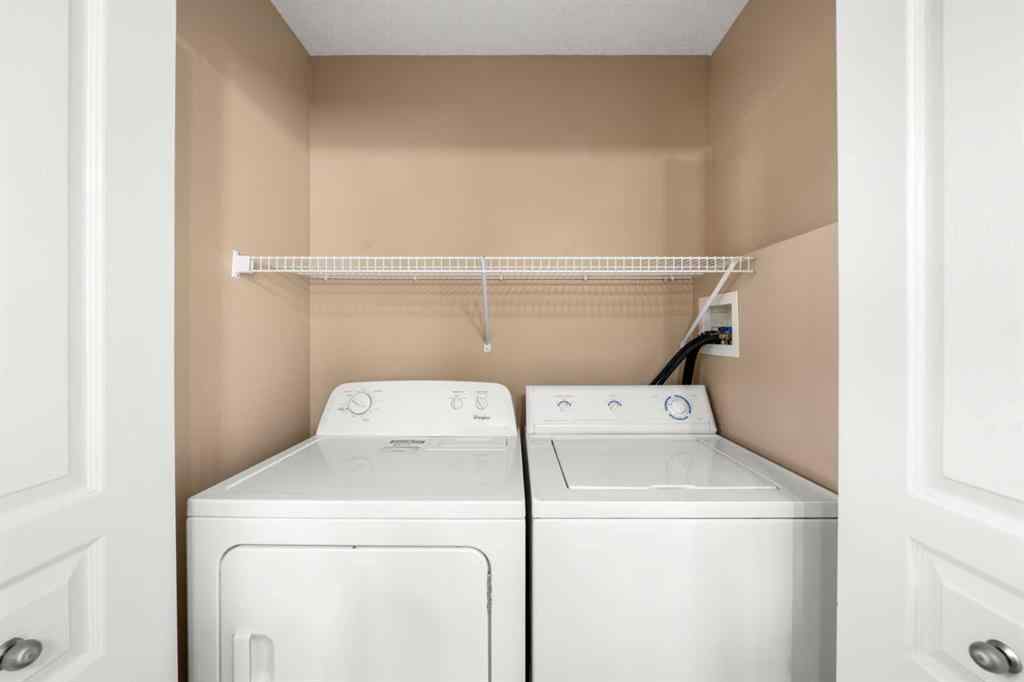 MLS® A2260860 - 70 Crystal Shores Cove  in Crystal Shores Okotoks, Residential