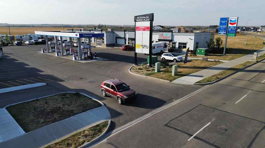 MLS® A2260890 - Unit #115 5302 Vista Trail  in Valley Ridge Blackfalds, Commercial