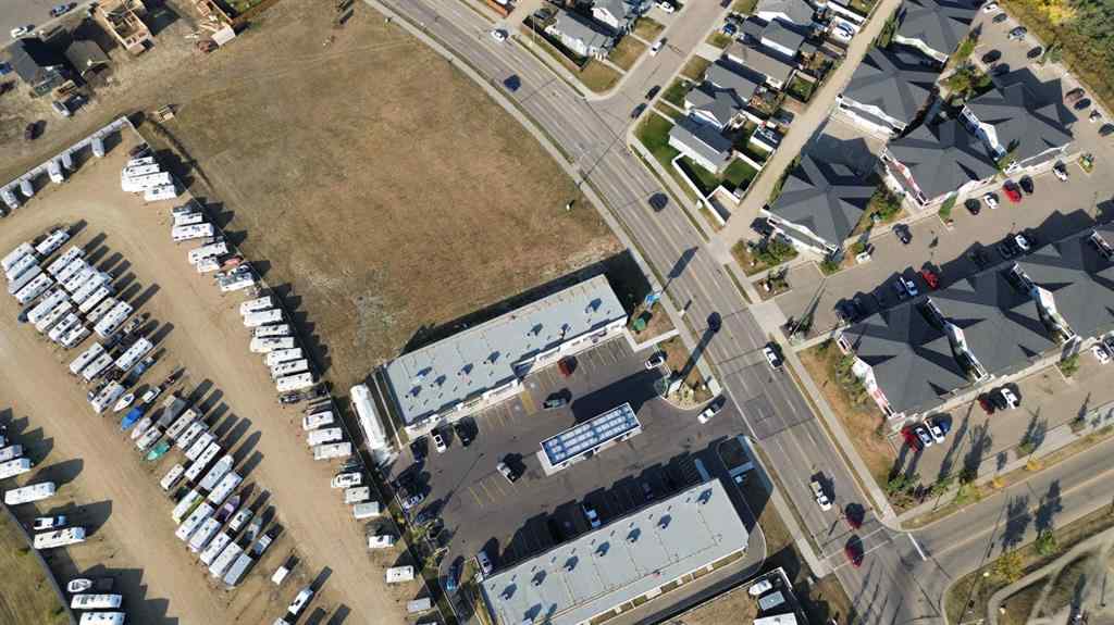 MLS® A2260890 - Unit #115 5302 Vista Trail  in Valley Ridge Blackfalds, Commercial