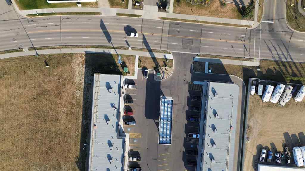 MLS® A2260890 - Unit #115 5302 Vista Trail  in Valley Ridge Blackfalds, Commercial