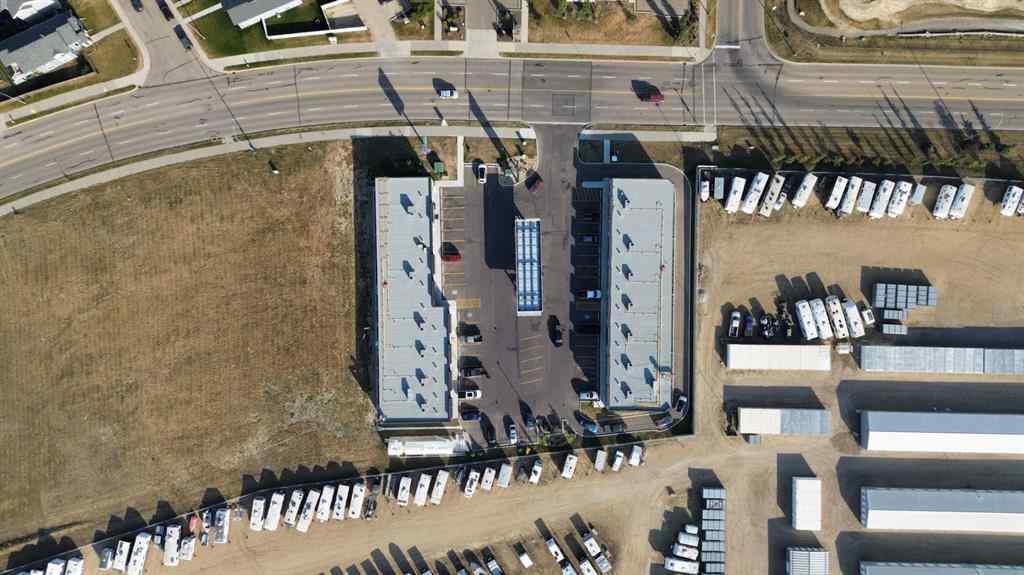 MLS® A2260894 - Unit #215 5302 Vista Trail  in Valley Ridge Blackfalds, Commercial