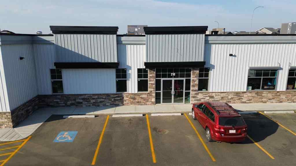 MLS® A2260902 - Unit #210 5302 Vista Trail  in Valley Ridge Blackfalds, Commercial