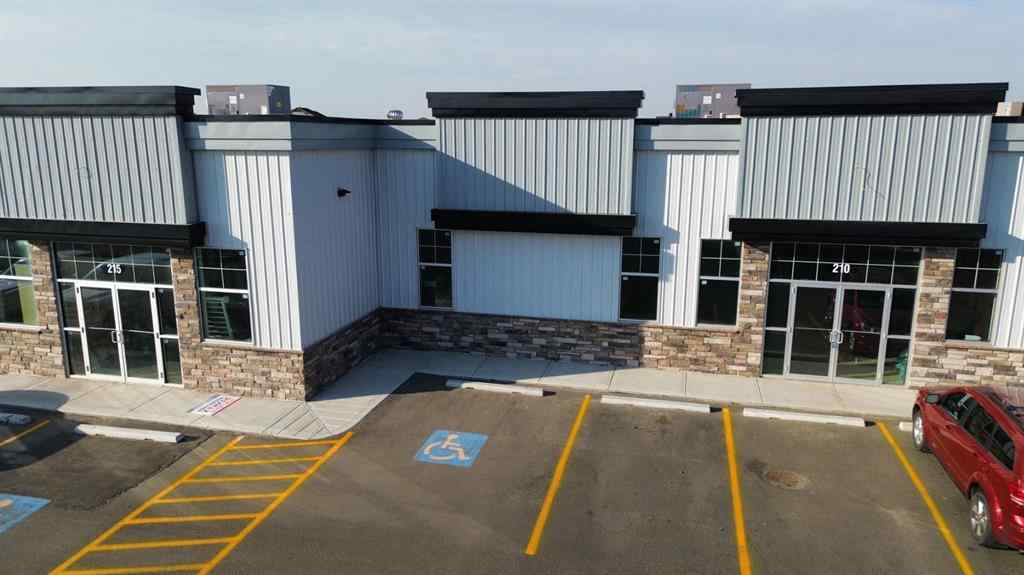 MLS® A2260902 - Unit #210 5302 Vista Trail  in Valley Ridge Blackfalds, Commercial