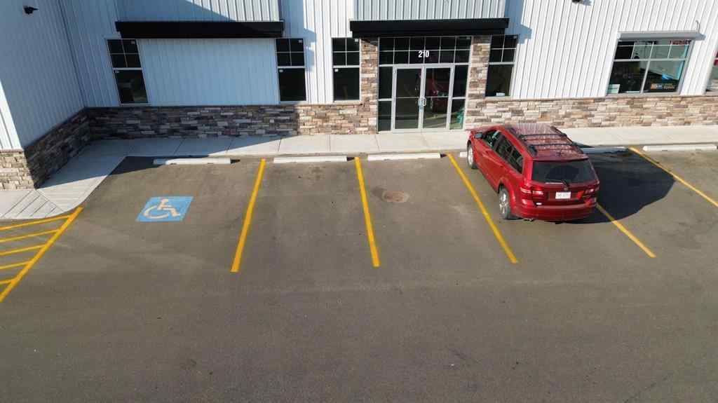 MLS® A2260902 - Unit #210 5302 Vista Trail  in Valley Ridge Blackfalds, Commercial