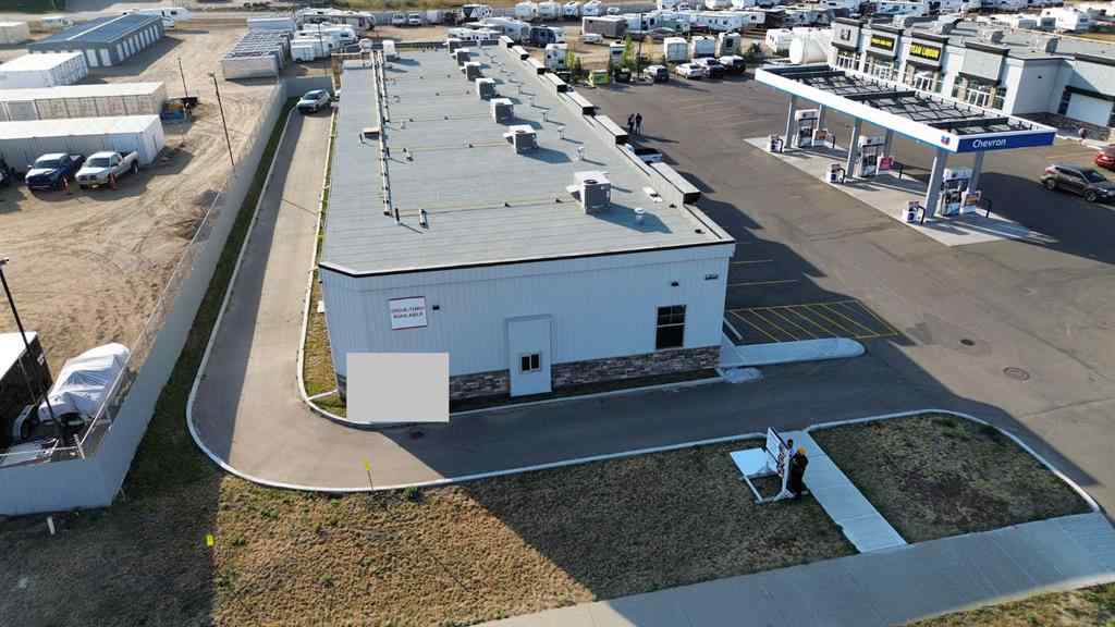 MLS® A2260902 - Unit #210 5302 Vista Trail  in Valley Ridge Blackfalds, Commercial