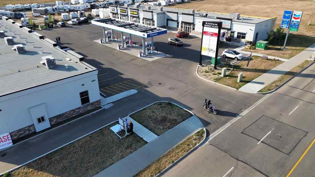 MLS® A2260902 - Unit #210 5302 Vista Trail  in Valley Ridge Blackfalds, Commercial