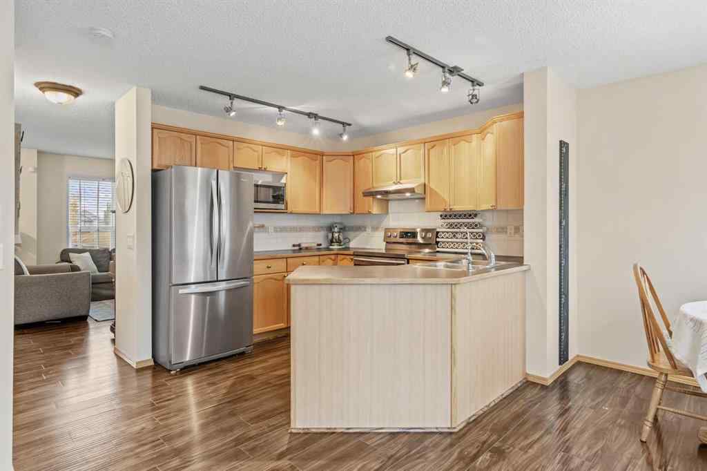 MLS® A2260967 - 229 Hidden Hills Place NW in Hidden Valley Calgary, Residential