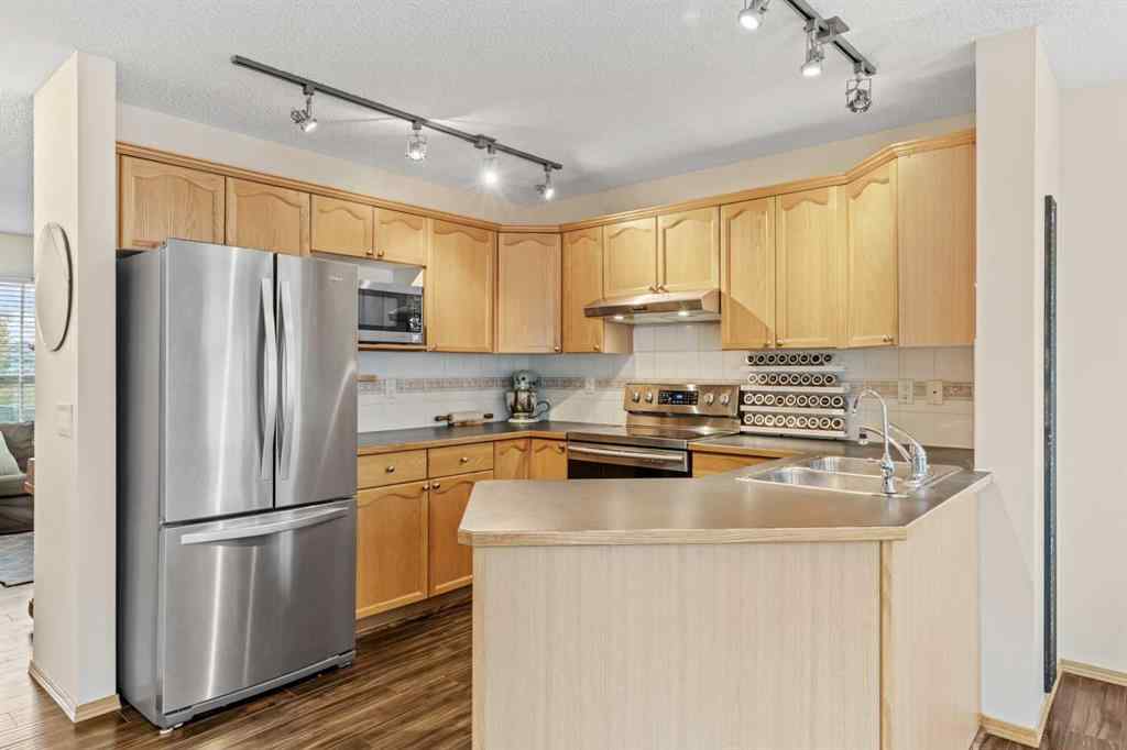 MLS® A2260967 - 229 Hidden Hills Place NW in Hidden Valley Calgary, Residential