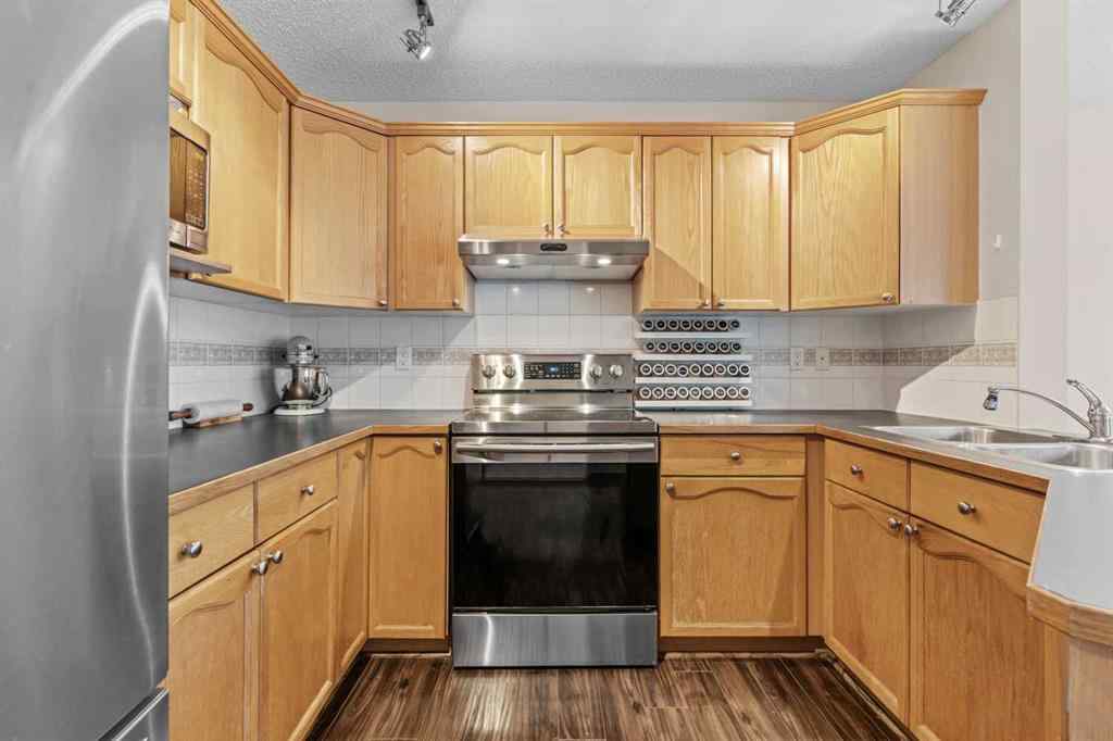 MLS® A2260967 - 229 Hidden Hills Place NW in Hidden Valley Calgary, Residential