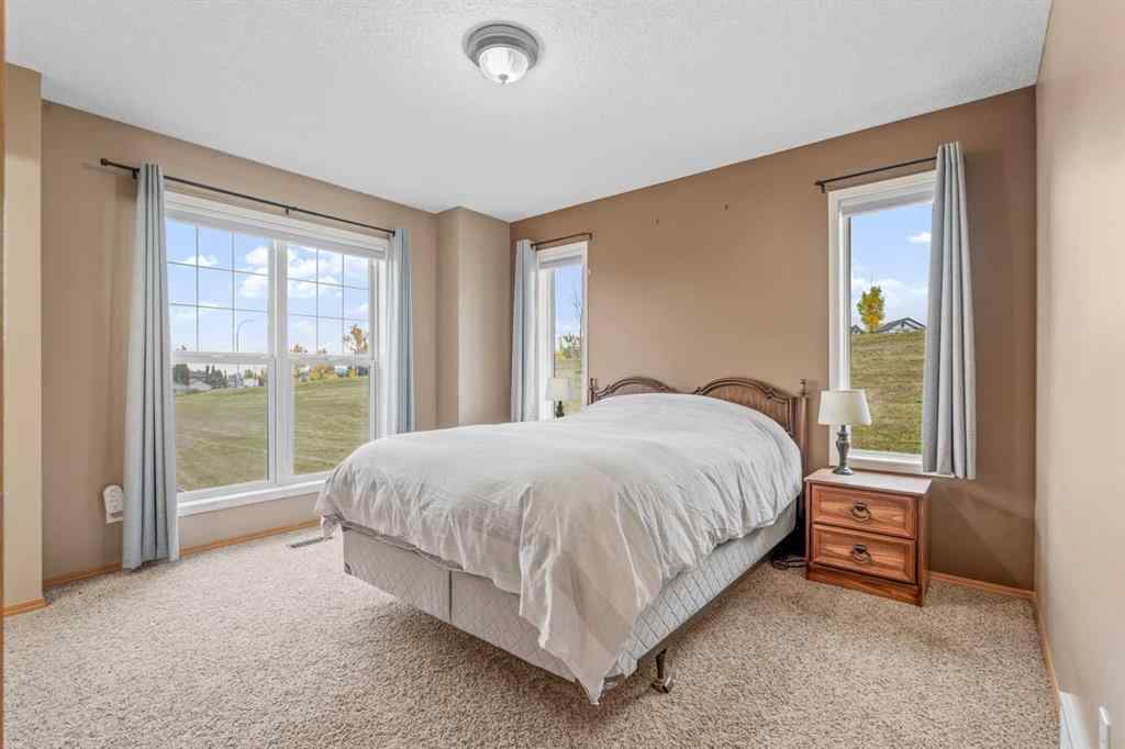 MLS® A2260967 - 229 Hidden Hills Place NW in Hidden Valley Calgary, Residential
