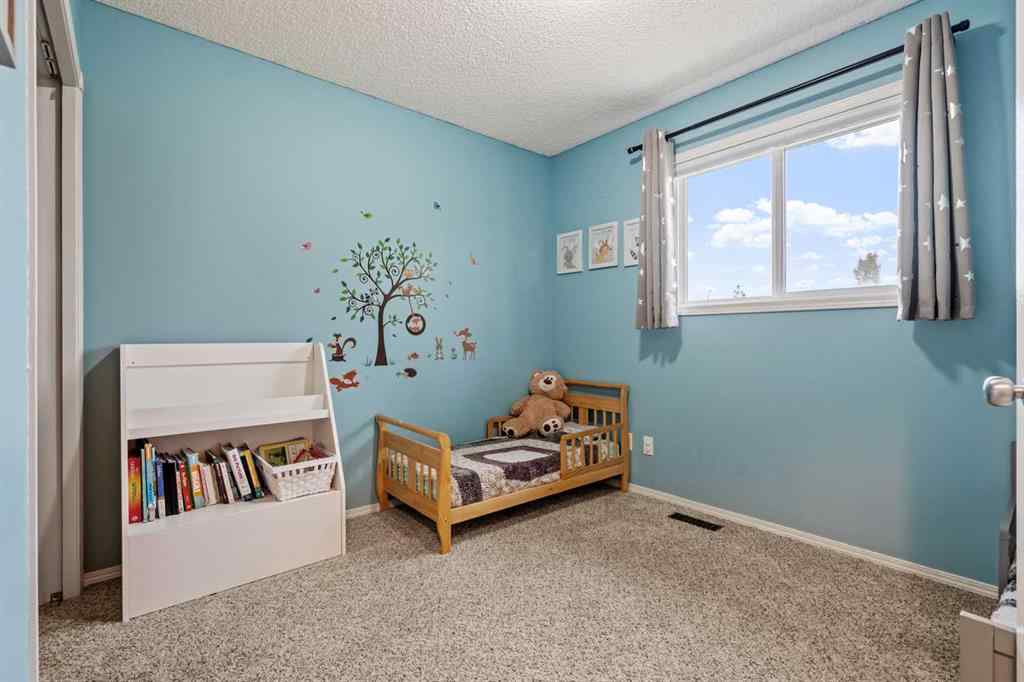 MLS® A2260967 - 229 Hidden Hills Place NW in Hidden Valley Calgary, Residential