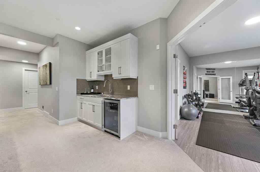 MLS® A2260980 - 25 Rock Lake Heights NW in Rocky Ridge Calgary, Residential