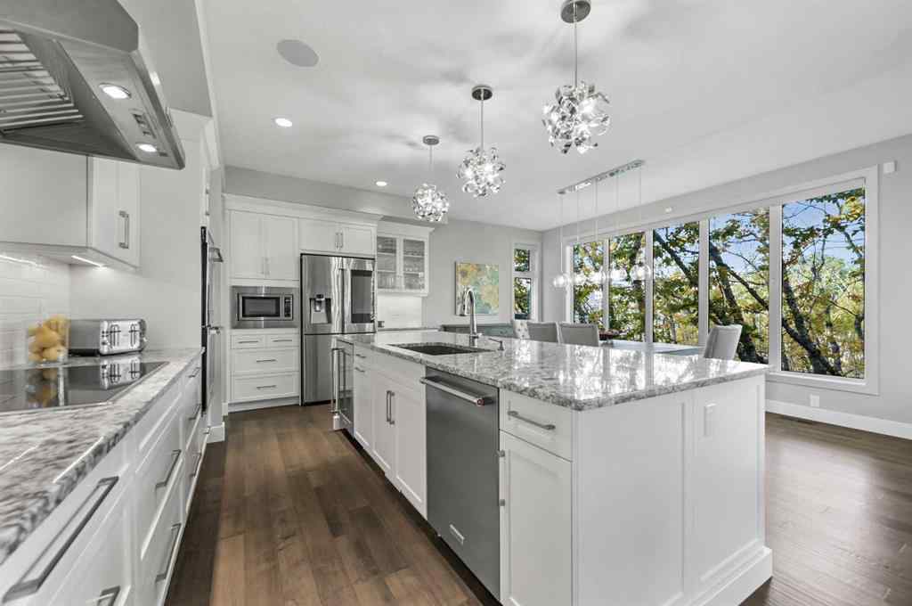 MLS® A2260980 - 25 Rock Lake Heights NW in Rocky Ridge Calgary, Residential