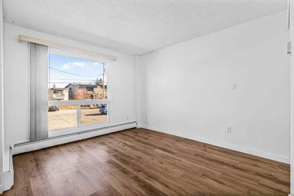 MLS® A2260989 - Unit #205 4512 75 Street NW in Bowness Calgary, Residential