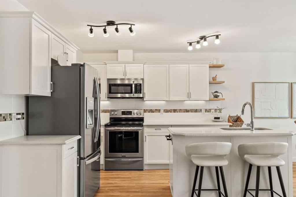 MLS® A2260995 - 151 Kingsbridge Road SE in Kings Heights Airdrie, Residential