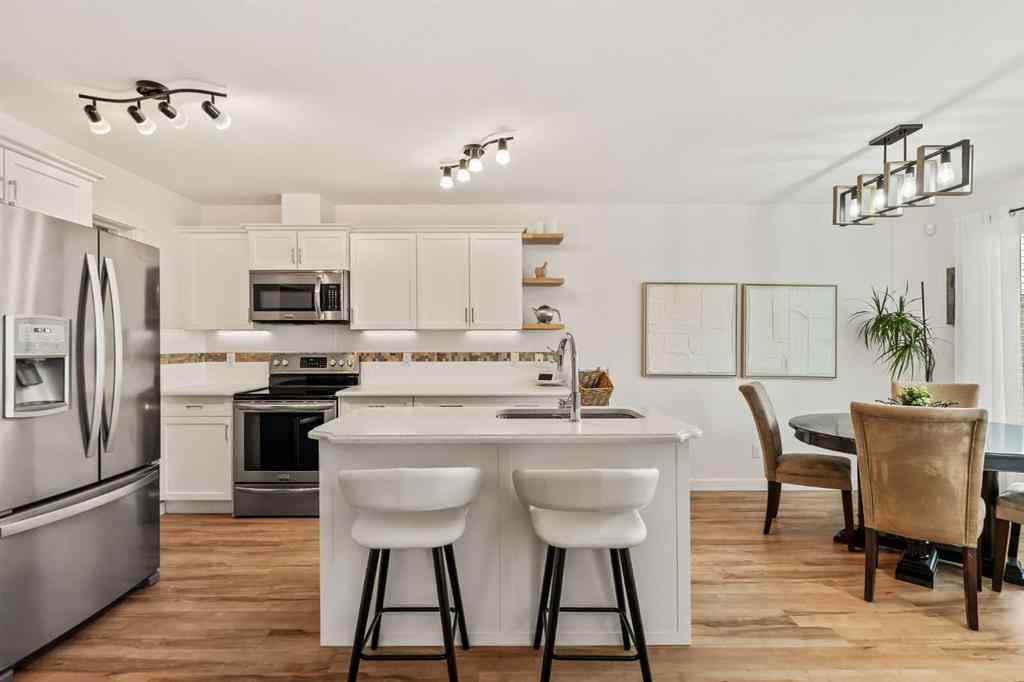 MLS® A2260995 - 151 Kingsbridge Road SE in Kings Heights Airdrie, Residential