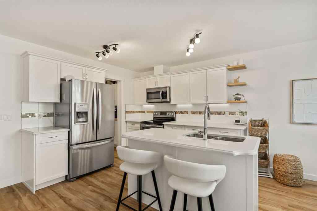 MLS® A2260995 - 151 Kingsbridge Road SE in Kings Heights Airdrie, Residential