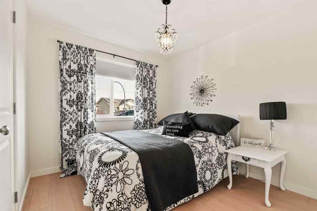 MLS® A2260995 - 151 Kingsbridge Road SE in Kings Heights Airdrie, Residential