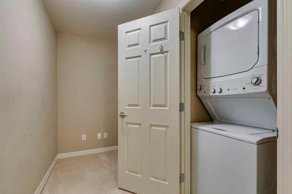 MLS® A2261003 - Unit #2114 92 Crystal Shores Road  in Crystal Shores Okotoks, Residential