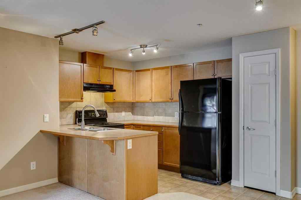 MLS® A2261003 - Unit #2114 92 Crystal Shores Road  in Crystal Shores Okotoks, Residential