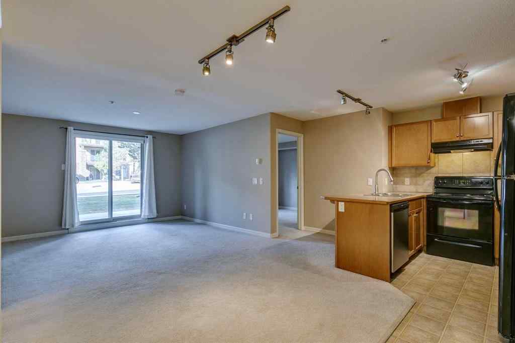 MLS® A2261003 - Unit #2114 92 Crystal Shores Road  in Crystal Shores Okotoks, Residential