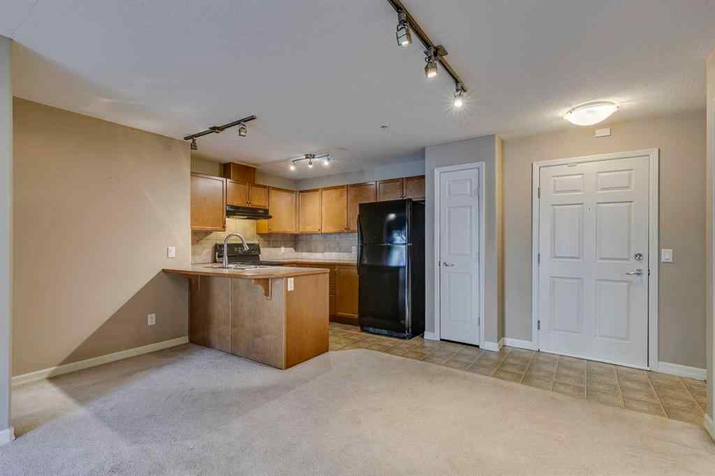 MLS® A2261003 - Unit #2114 92 Crystal Shores Road  in Crystal Shores Okotoks, Residential