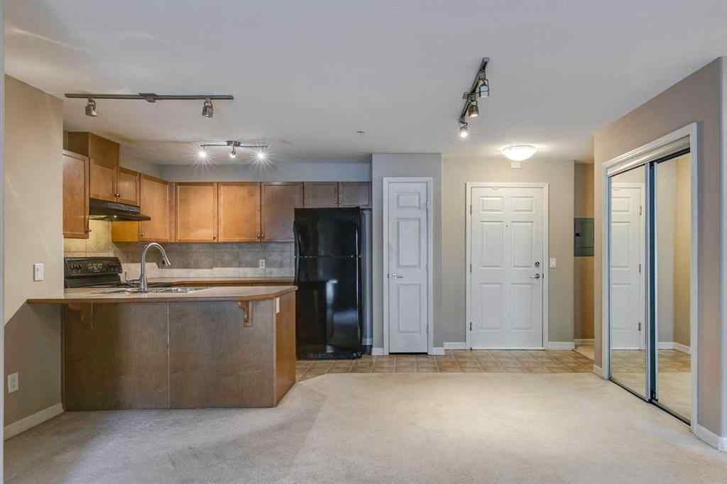 MLS® A2261003 - Unit #2114 92 Crystal Shores Road  in Crystal Shores Okotoks, Residential