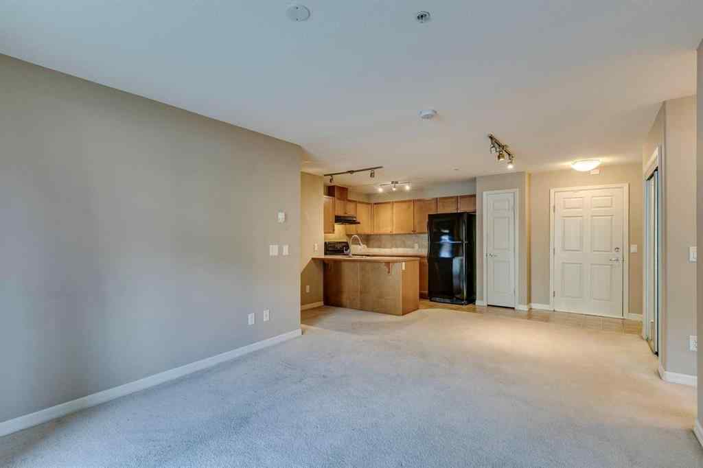 MLS® A2261003 - Unit #2114 92 Crystal Shores Road  in Crystal Shores Okotoks, Residential