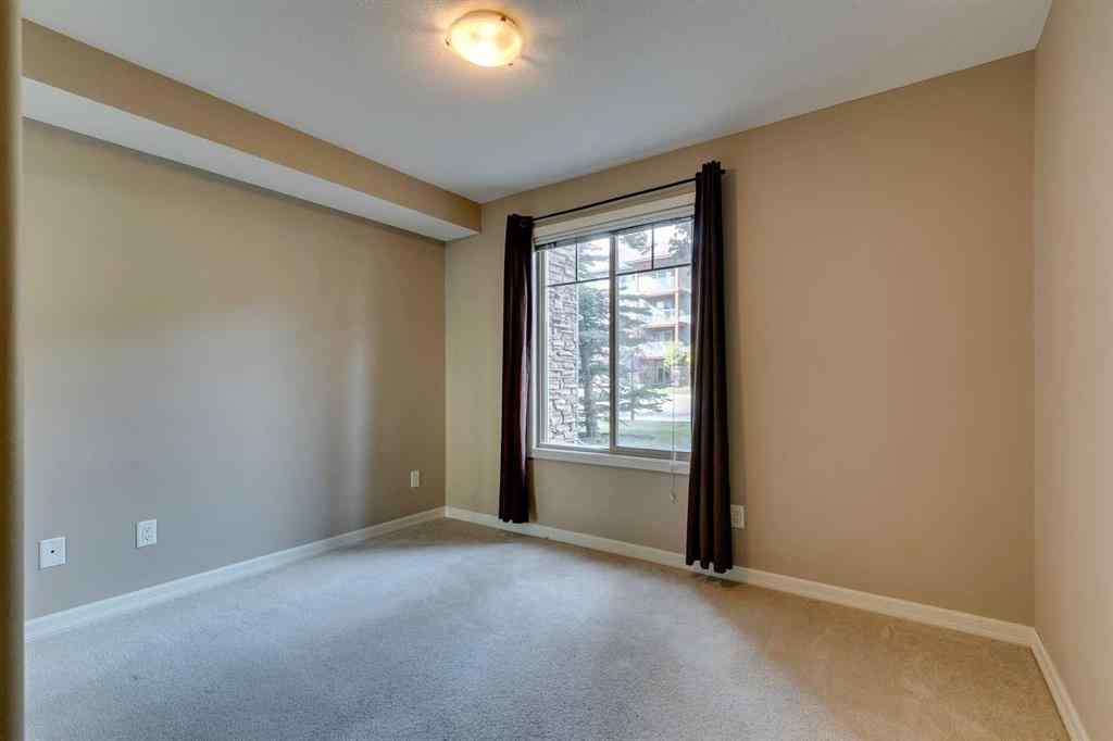 MLS® A2261003 - Unit #2114 92 Crystal Shores Road  in Crystal Shores Okotoks, Residential