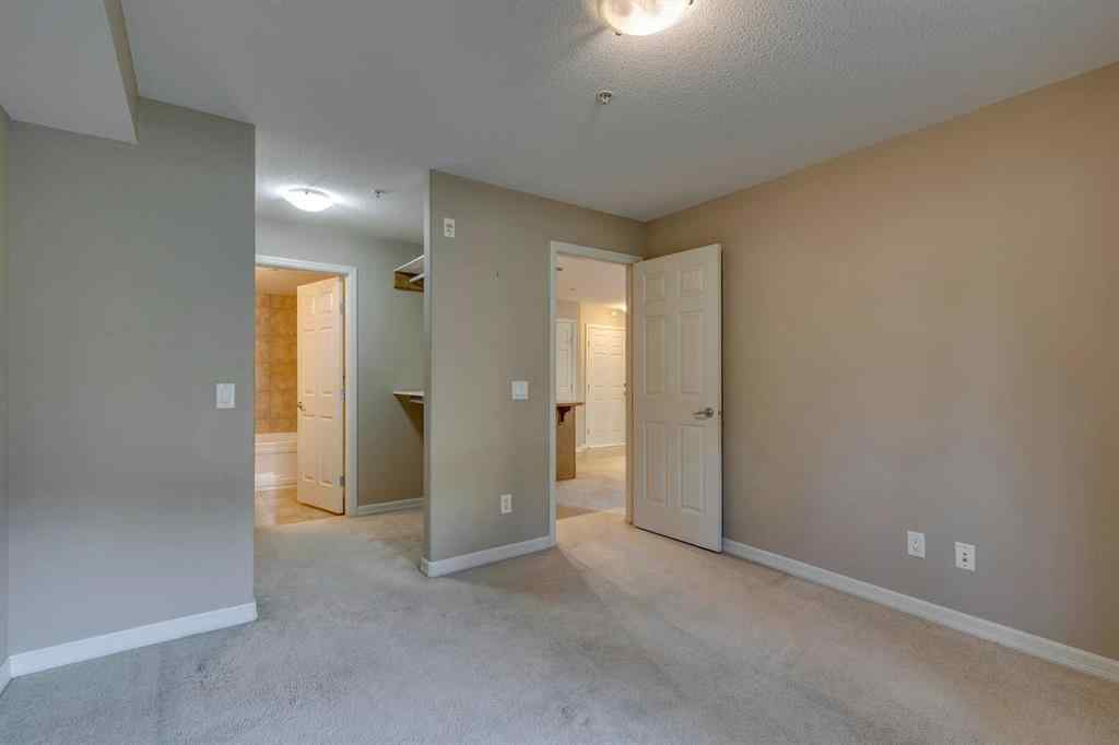 MLS® A2261003 - Unit #2114 92 Crystal Shores Road  in Crystal Shores Okotoks, Residential