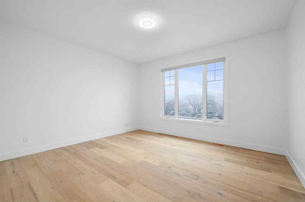 MLS® A2261004 - 54 Malibou Road SW in Meadowlark Park Calgary, Residential