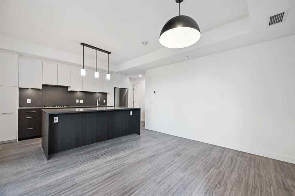 MLS® A2261023 - Unit #311 730 2 Avenue SW in Eau Claire Calgary, Residential