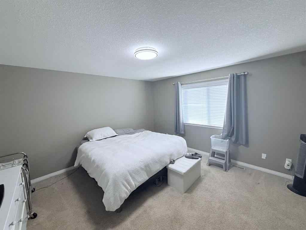 MLS® A2261034 - 8918 88 Street  in Riverstone Grande Prairie, Residential