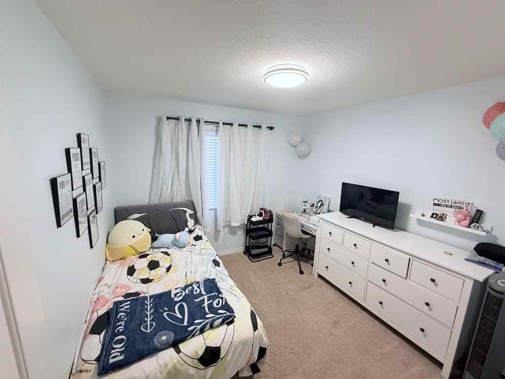 MLS® A2261034 - 8918 88 Street  in Riverstone Grande Prairie, Residential